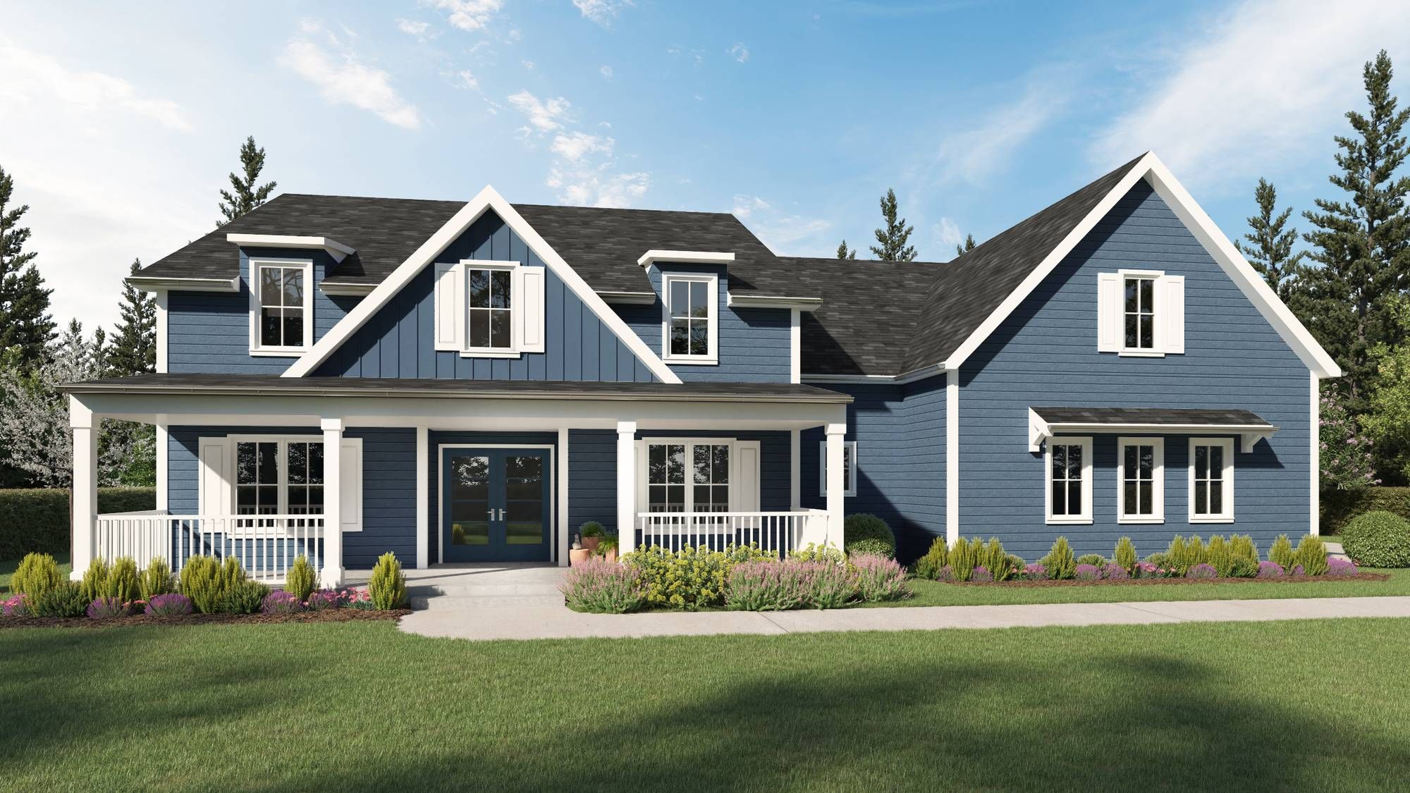 Two-story blue house with white trim, front porch, and landscaped yard, set against a backdrop of tall trees and blue sky at Mountain Crest Reserve